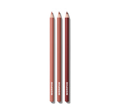 Three Morphe lip pencils on a white background