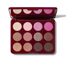 Makeup palette with various shades of eyeshadow on a white background-view-1