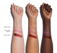 Three swatches of lipsticks on different skin tones with labels.-view-3