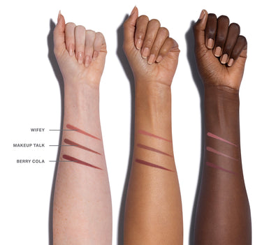 Three arms with different skin tones displaying lipstick swatches labeled 